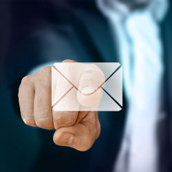 Finger pressing email icon